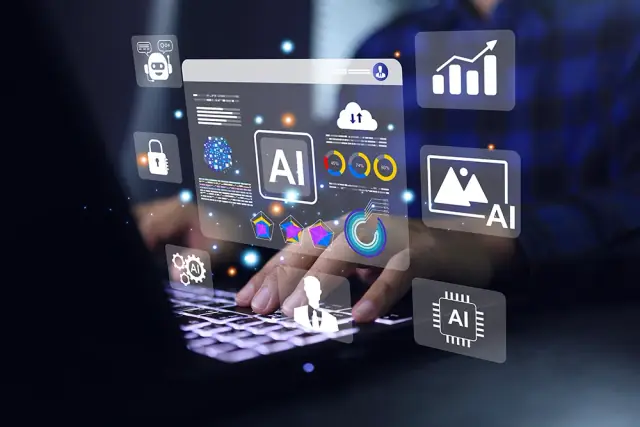 Hands typing on a laptop surrounded by floating translucent panels of AI icons, charts and a browser window in a dark office